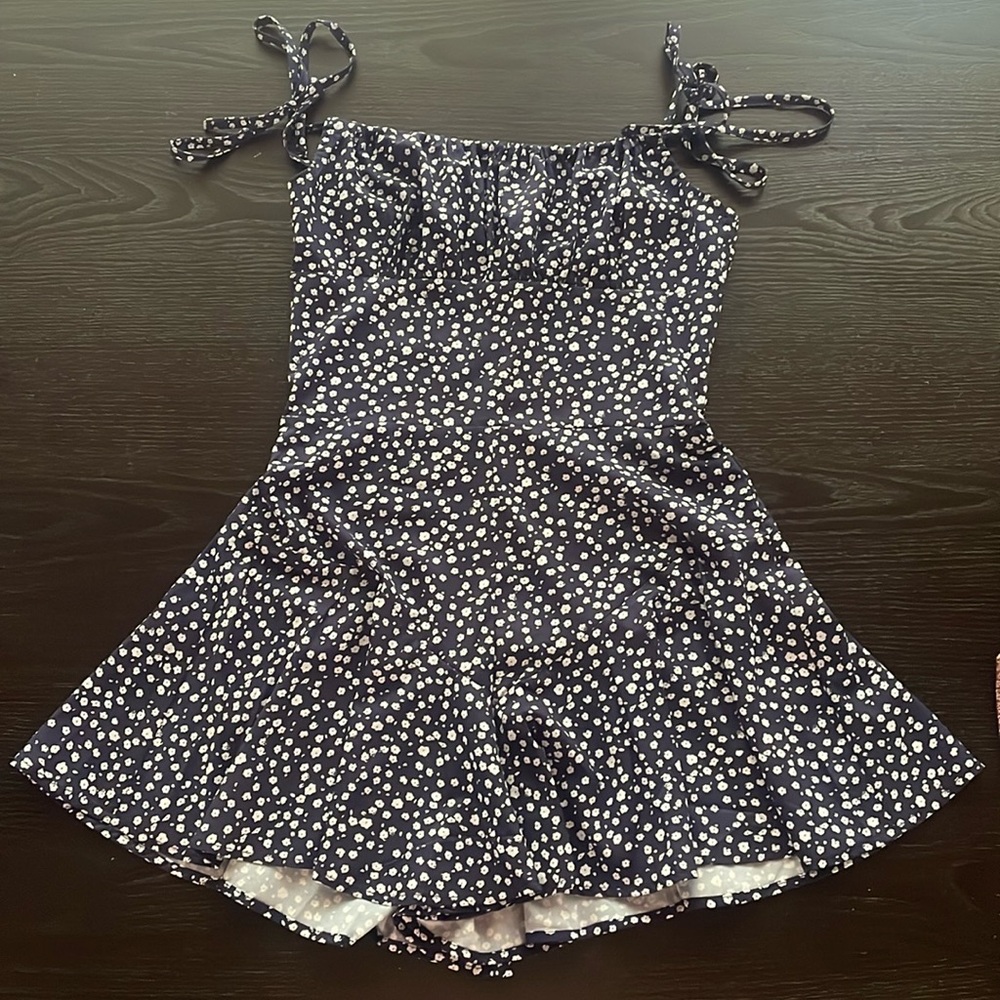 Navy blue and white floral romper
